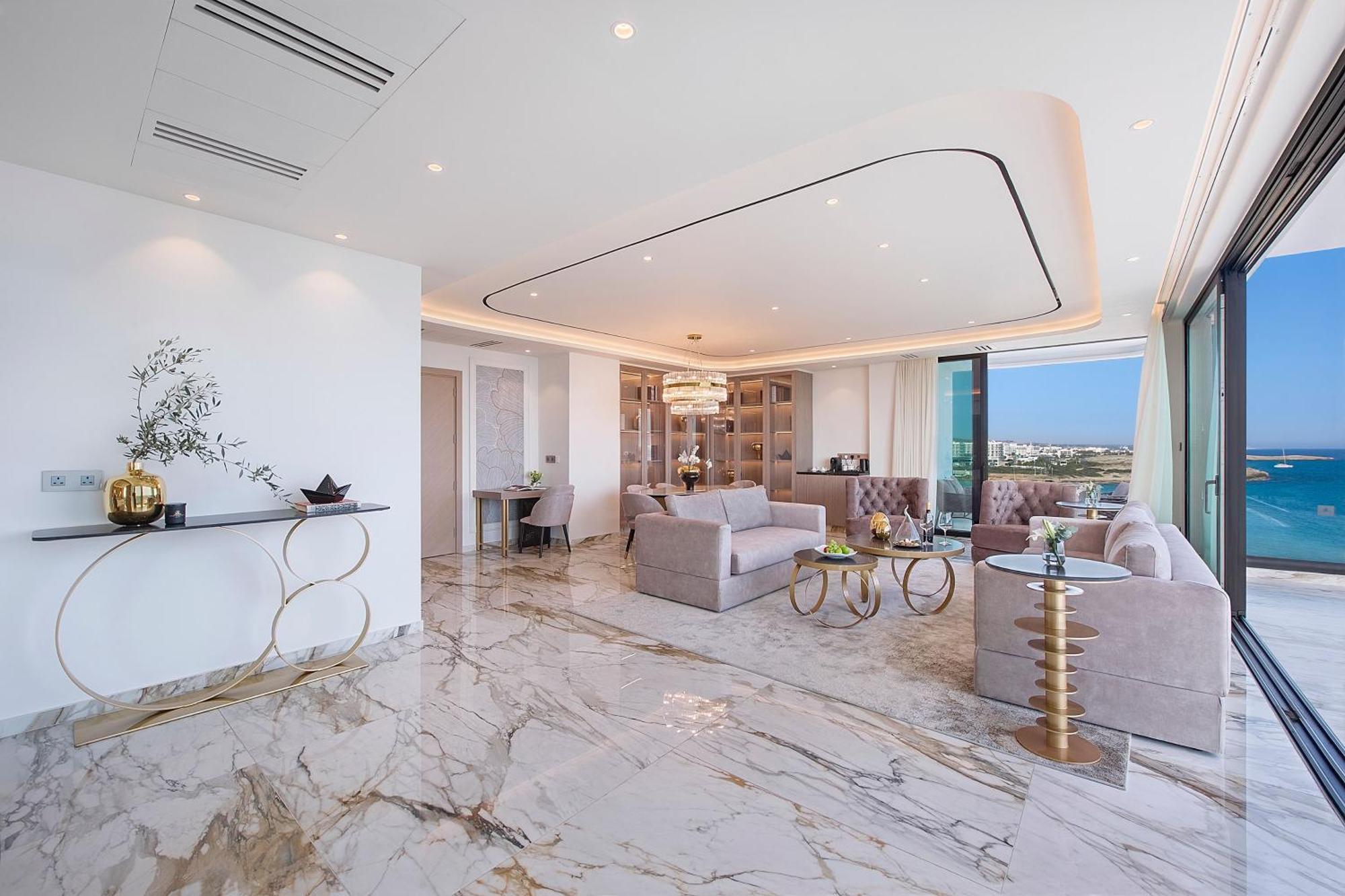 Adams Beach Hotel & Spa (Adults Only) Ayia Napa Bagian luar foto The interior of a penthouse at The Ritz-Carlton, DIFC